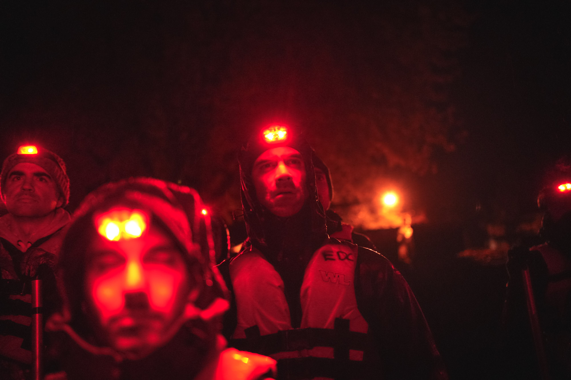 Night expedition under headlamps